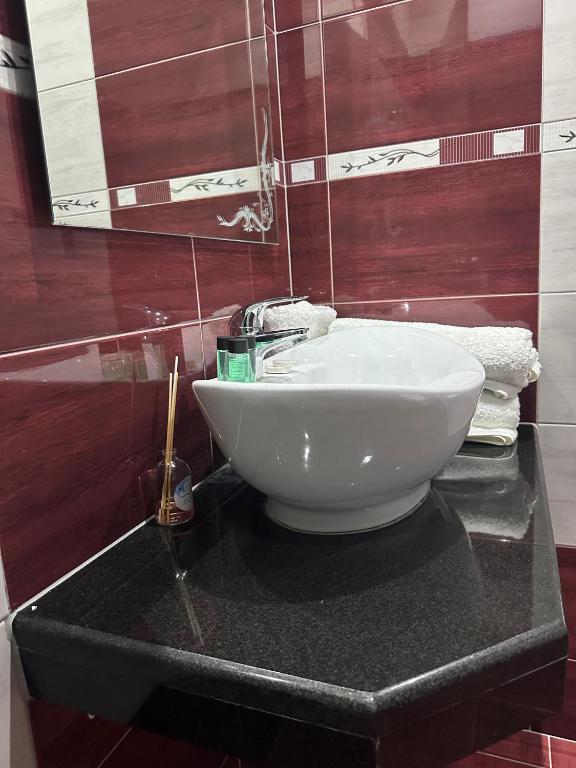 Koupelna v ubytování Hotel Selfo