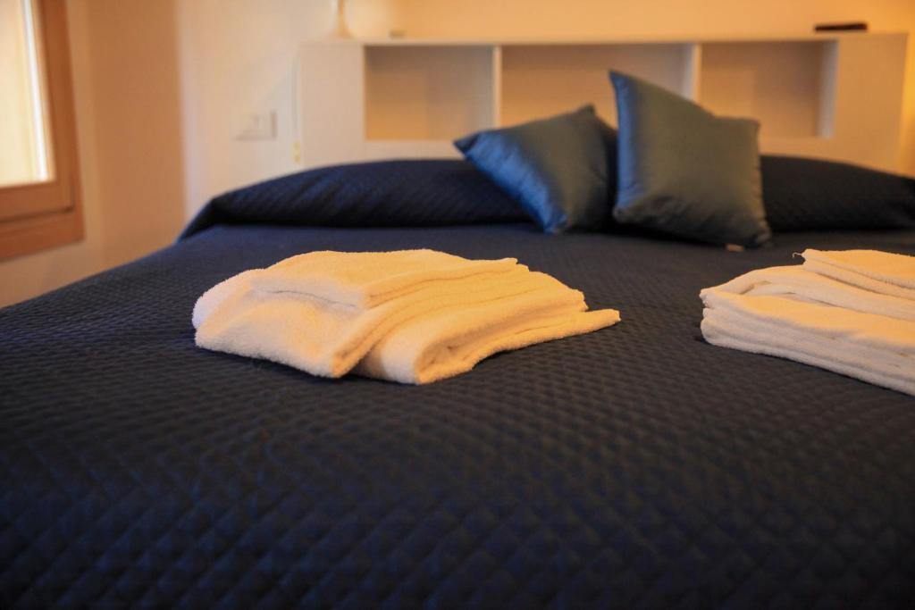 Postel nebo postele na pokoji v ubytování Guesthouse Villa Fabris