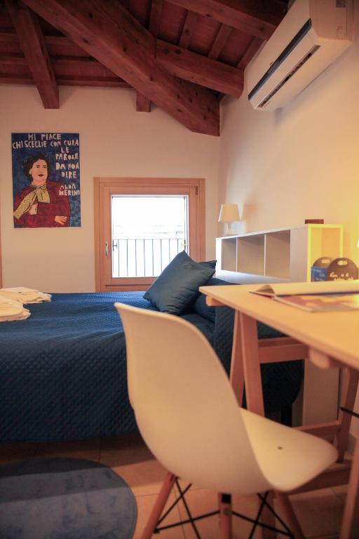 Postel nebo postele na pokoji v ubytování Guesthouse Villa Fabris