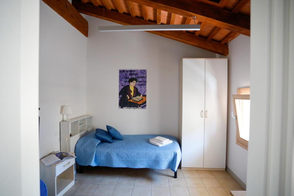 Postel nebo postele na pokoji v ubytování Guesthouse Villa Fabris