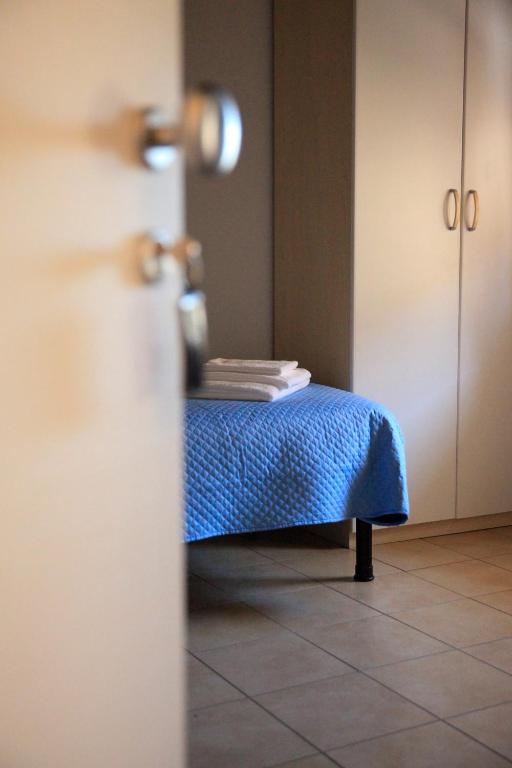 Postel nebo postele na pokoji v ubytování Guesthouse Villa Fabris