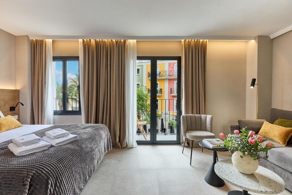 Postel nebo postele na pokoji v ubytování El Pont Alicante Apartments