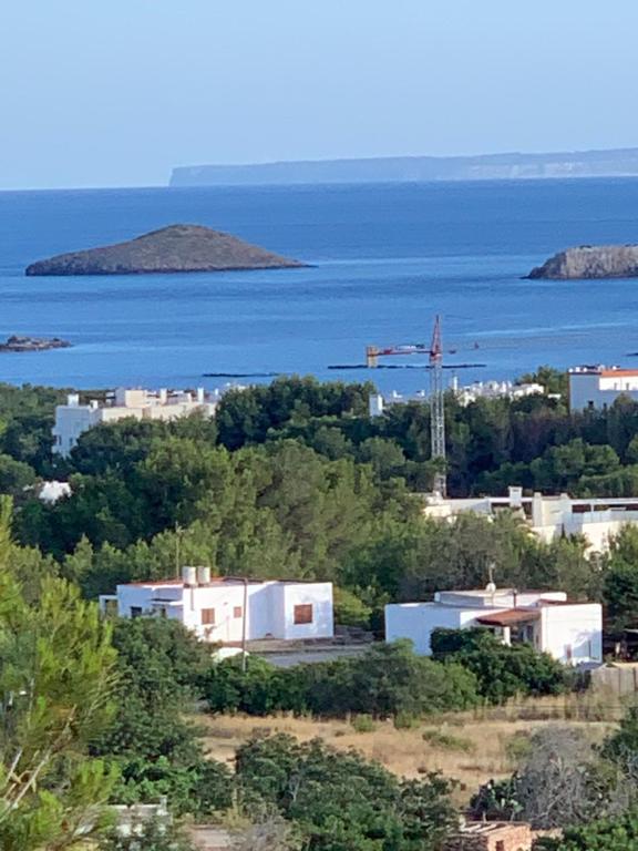 a view of a city and the ocean with buildings at AZUMAR in Santa Eularia des Riu