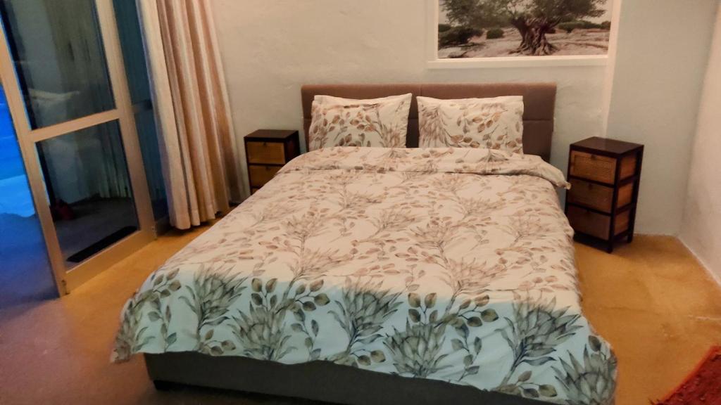 Posteľ alebo postele v izbe v ubytovaní Komissa΄s Beach House