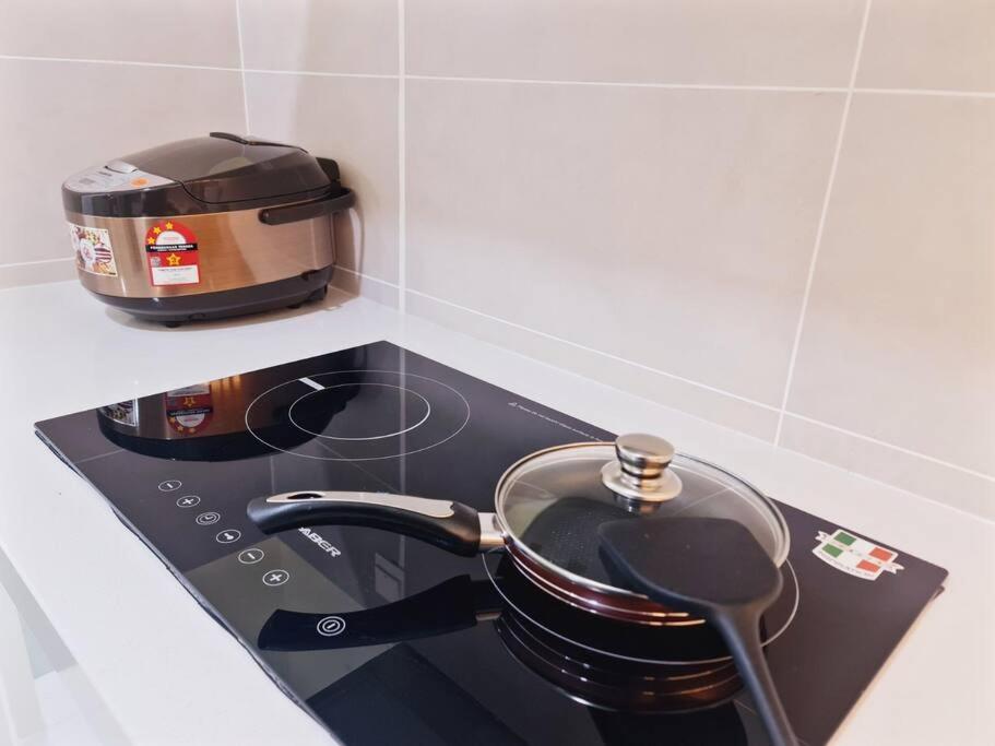 Een keuken of kitchenette bij UWen Sylist 2BR Family Suite