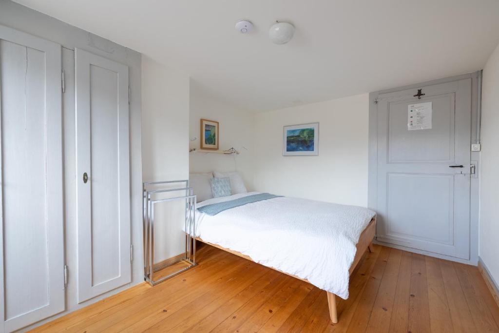 Llit o llits en una habitació de Chez Muna & Lucien