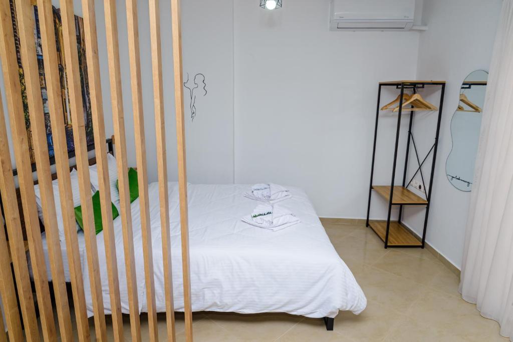 Postel nebo postele na pokoji v ubytování Emi's House