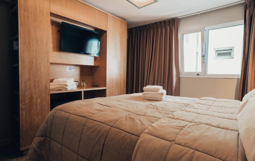 Postel nebo postele na pokoji v ubytování Hotel EcoSki by bund