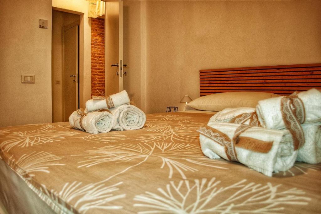 Postel nebo postele na pokoji v ubytování Centro storico Lovely House R9345