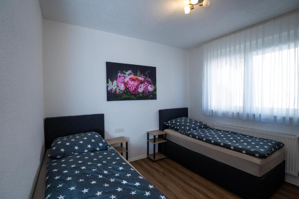 Voodi või voodid majutusasutuse Hotel Weibertreu toas