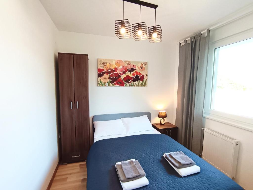 Krevet ili kreveti u jedinici u okviru objekta Garden view in the downtown