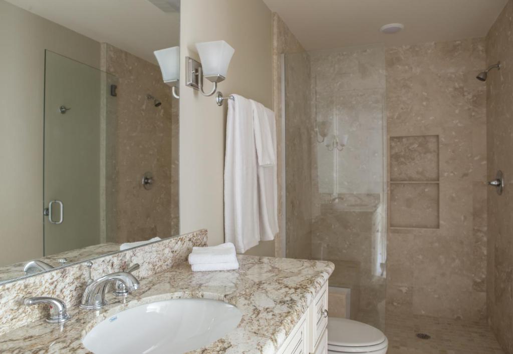 a bathroom with a sink and a shower at The Bywater in New Orleans