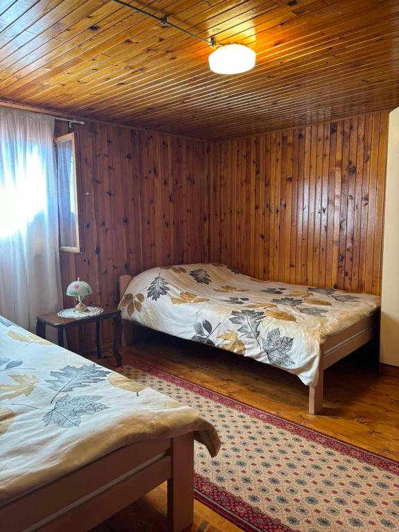 Postel nebo postele na pokoji v ubytování Ljubav Stara Zaovine