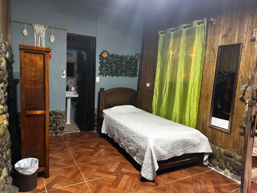 Postel nebo postele na pokoji v ubytování Hostel Rústico MarAbi