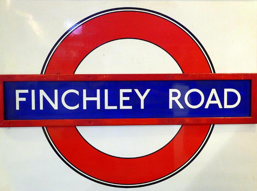 a blue and red sign that reads firefly road at Greencroft Family Villa in London