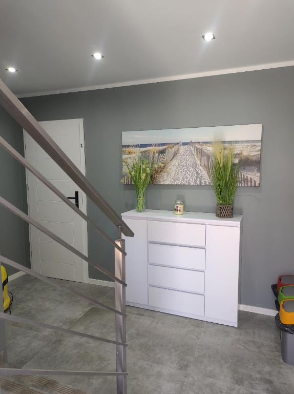 Fotografia z galérie ubytovania Apartament U Bosmana v destinácii Dźwirzyno