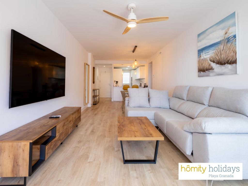 TV a/nebo společenská místnost v ubytování Homity Holidays - Playa Granada - Mar de Astrid