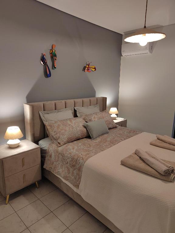 Postel nebo postele na pokoji v ubytování The cozy seaside apartment
