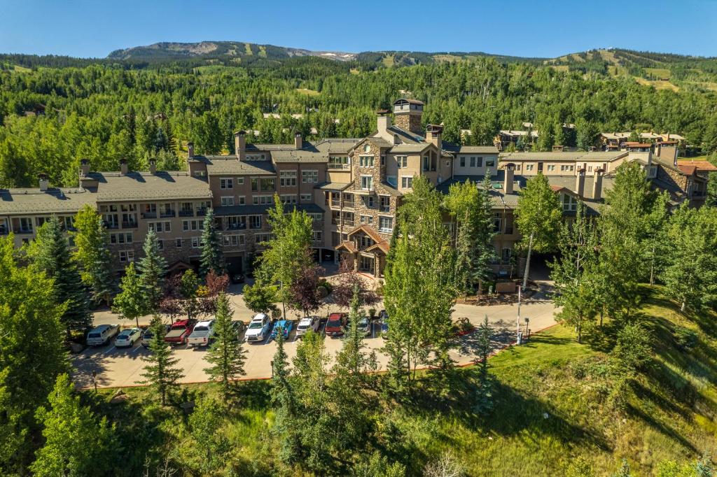 an aerial view of a resort with a parking lot at Woodrun Place in Snowmass Village