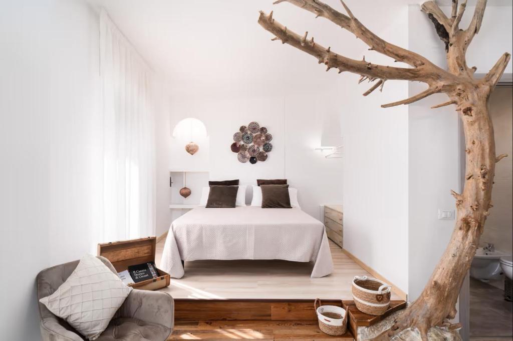 Ένα ή περισσότερα κρεβάτια σε δωμάτιο στο Giojas 125