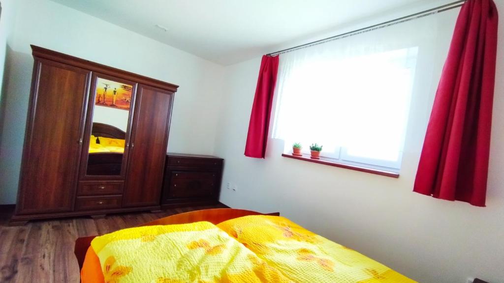 Postel nebo postele na pokoji v ubytování Apartmán SCHEYER