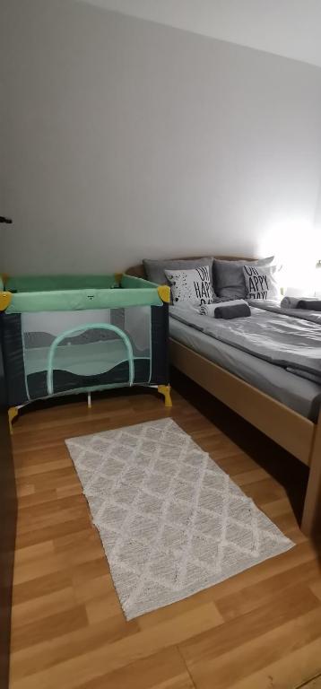 Postel nebo postele na pokoji v ubytování Apartman MAŠA