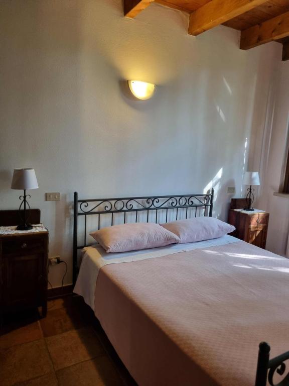 Postel nebo postele na pokoji v ubytování Agriturismo Case in Collina