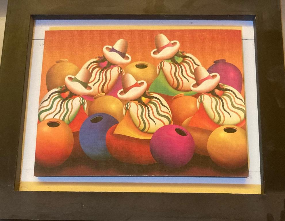 a painting of fruits and vegetables in a frame at Thiago MG in Chiclayo