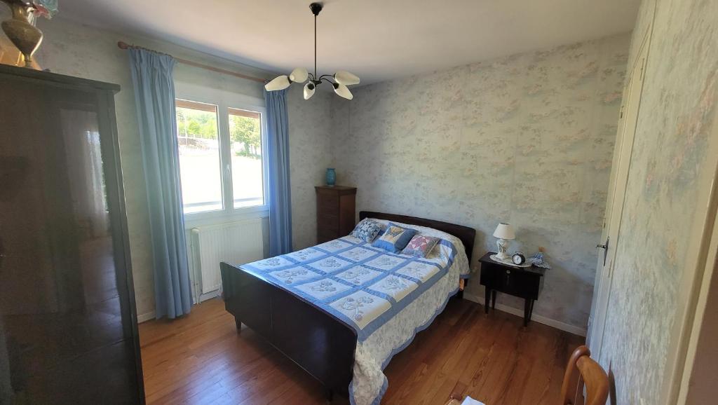 Postel nebo postele na pokoji v ubytování La Maison