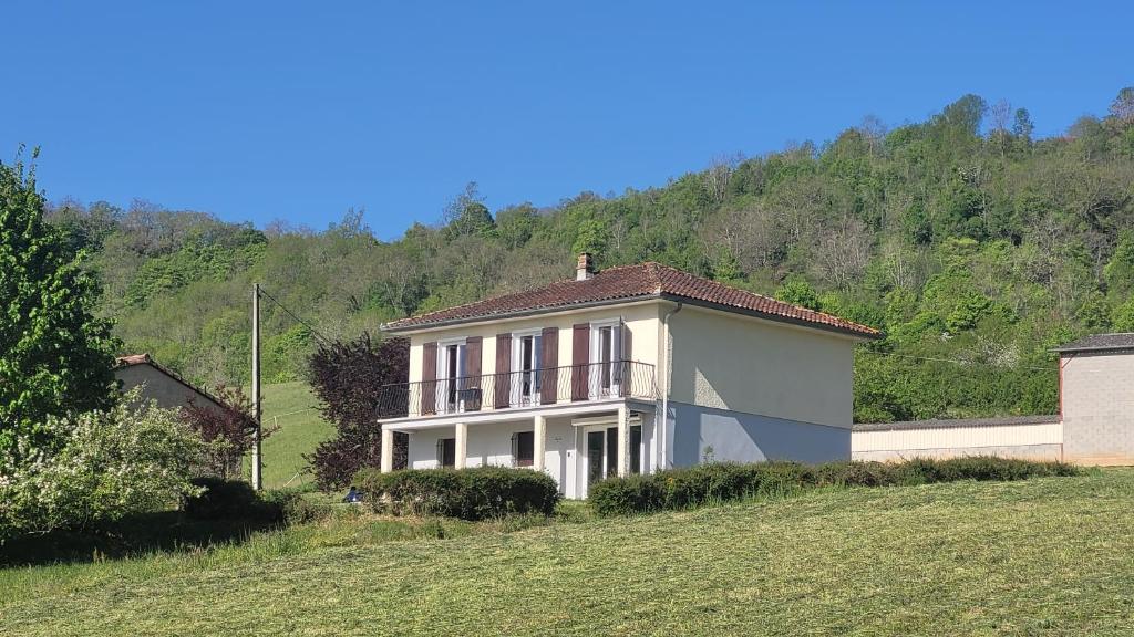 a white house on top of a hill at Maison in Le Mas-dʼAzil