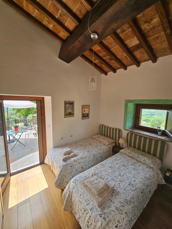A bed or beds in a room at Villa delle lucciole