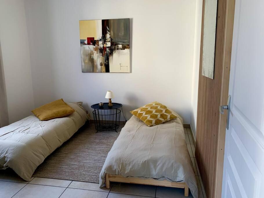 Postel nebo postele na pokoji v ubytování Charmant appartement