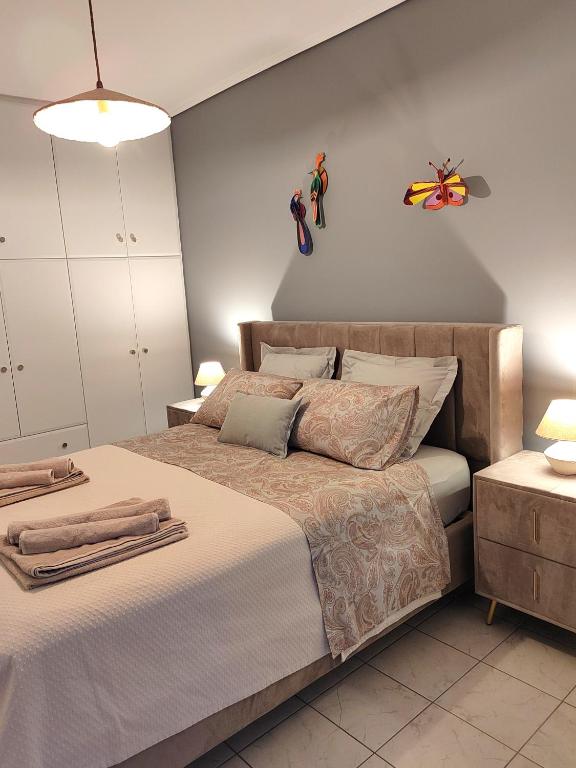 Postel nebo postele na pokoji v ubytování The cozy seaside apartment