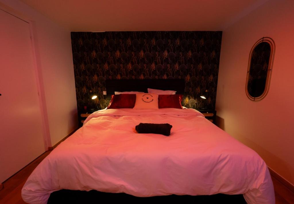 Ένα ή περισσότερα κρεβάτια σε δωμάτιο στο Romance dans les vignes