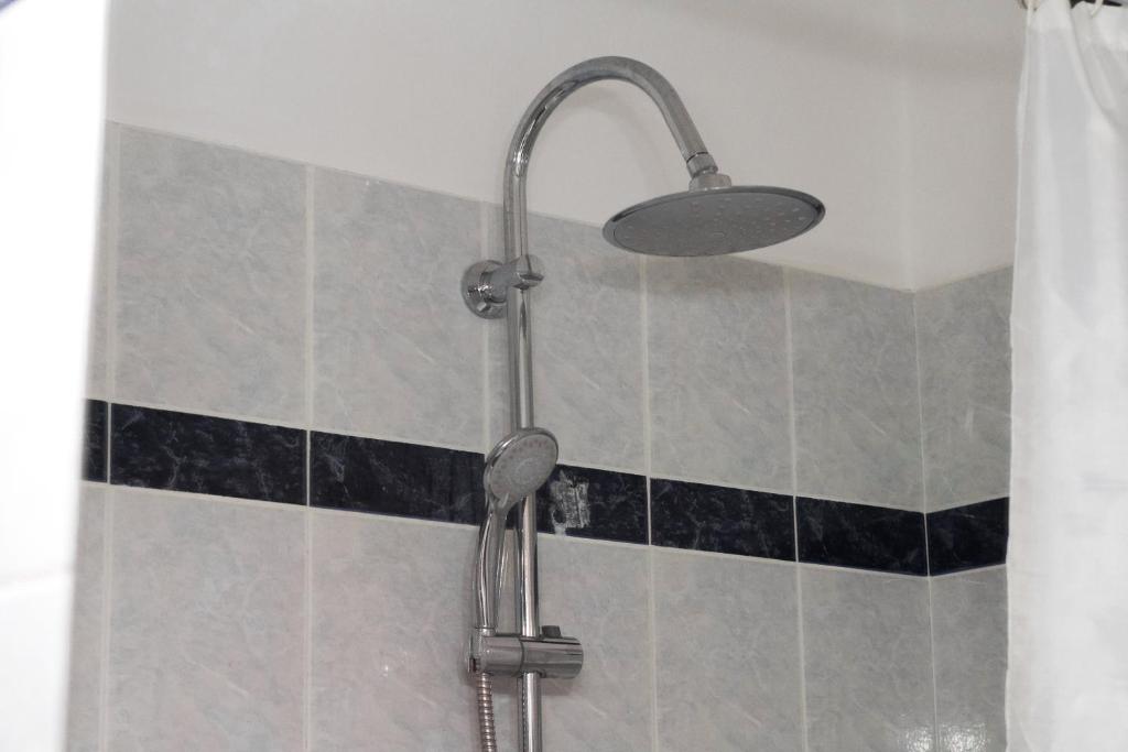 A bathroom at Pink Sand Sea Apartment