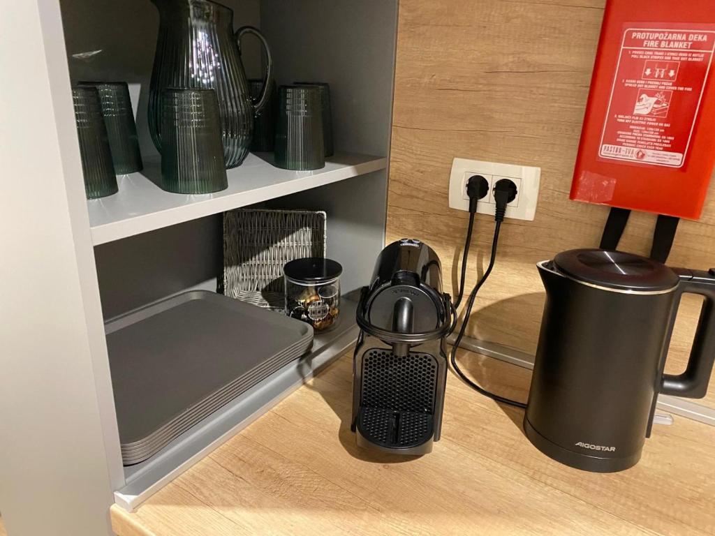 Příslušenství pro přípravu čaje a kávy v ubytování Mobile Home Anja