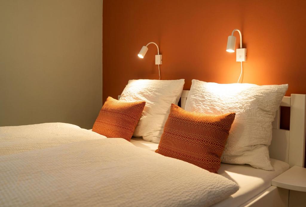 Postel nebo postele na pokoji v ubytování B&B Gösselsdorfer Seeblick