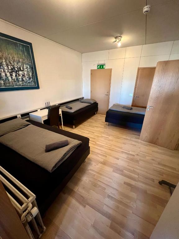 Voodi või voodid majutusasutuse Fisherinn Guesthouse toas