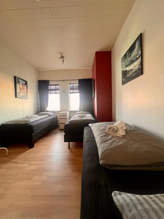 Voodi või voodid majutusasutuse Fisherinn Guesthouse toas
