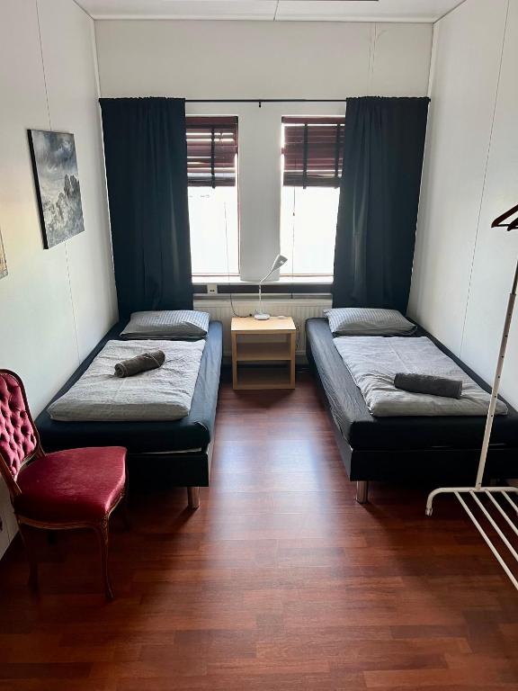 Voodi või voodid majutusasutuse Fisherinn Guesthouse toas