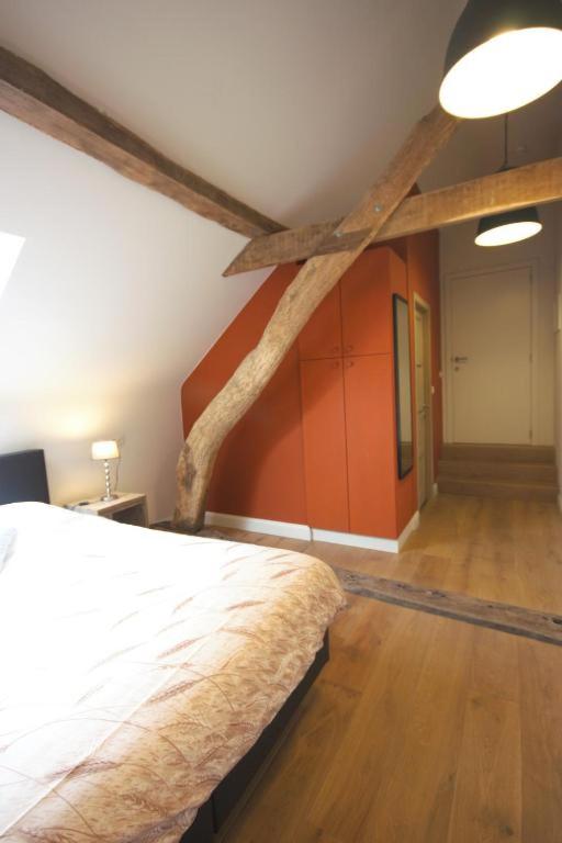 Postel nebo postele na pokoji v ubytování B&B Crijbohoeve
