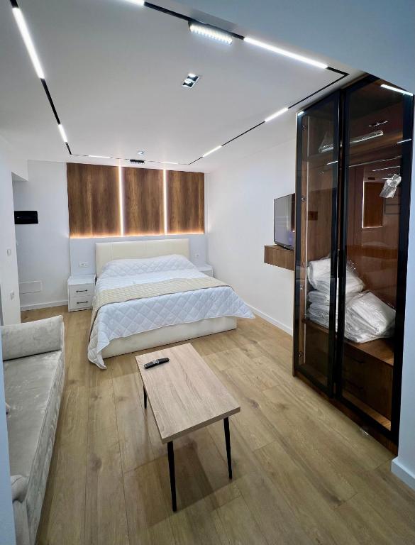 Postel nebo postele na pokoji v ubytování Aria's Apartments