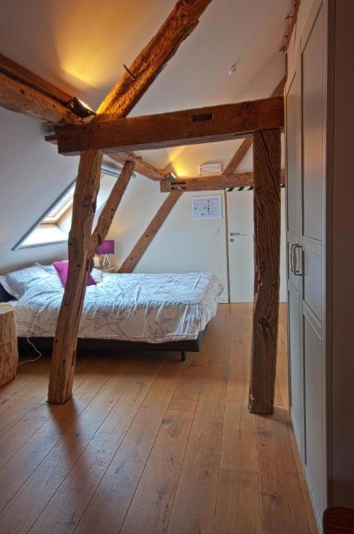 Postel nebo postele na pokoji v ubytování B&B Crijbohoeve