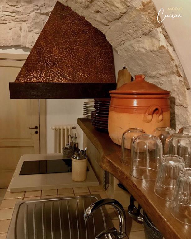 Kuchyň nebo kuchyňský kout v ubytování Trullo Galileo