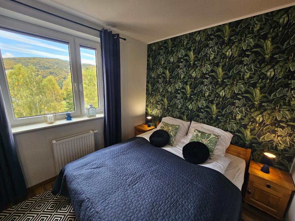 Postel nebo postele na pokoji v ubytování Apartment Panorama Wisła