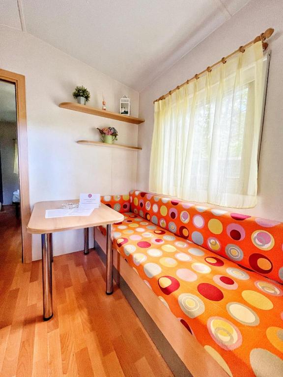 Postel nebo postele na pokoji v ubytování CAMPING AMALASUNTA