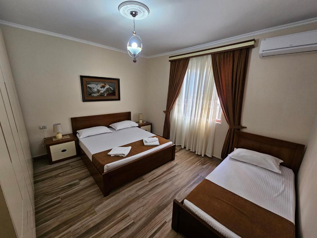 Uma cama ou camas num quarto em Apartment Koka