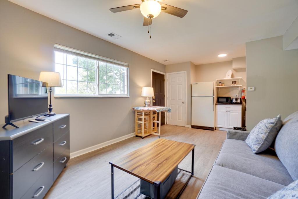 a living room with a couch and a table at Dtwn Columbus Getaway Pet Friendly with Fee! in Columbus