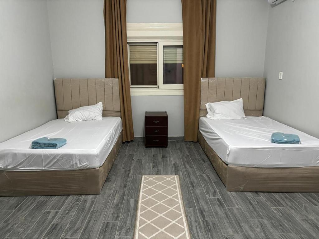 Postel nebo postele na pokoji v ubytování Heliopolis Residence Shorouk city, Cairo (premium)