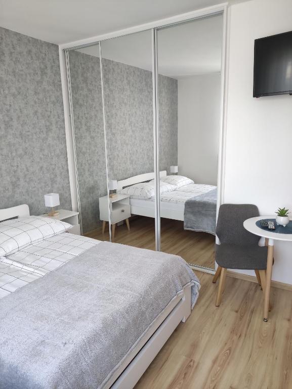 Postel nebo postele na pokoji v ubytování Villa Joanna